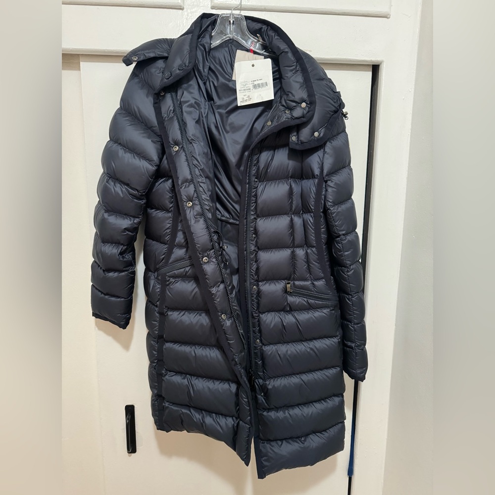 Moncler "Hermine" long puffer jacket with grosgrain trim on pockets.